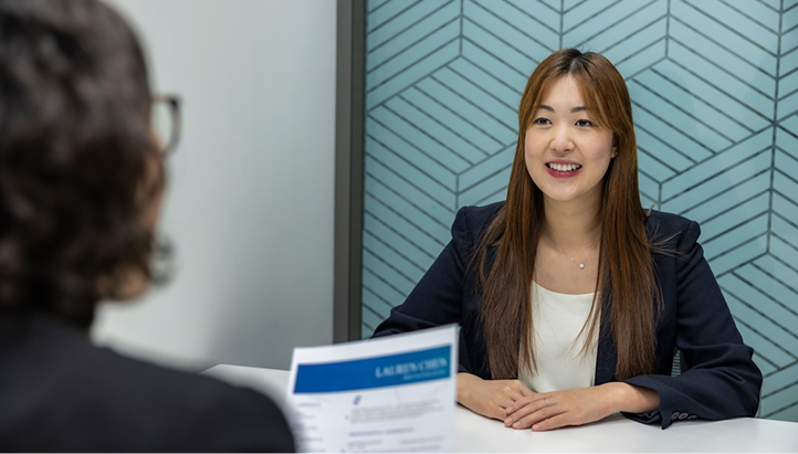 Professional job interview between two women in a modern office